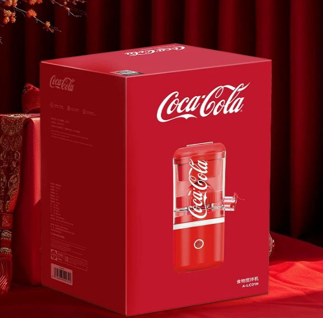 Exprimidor eléctrico de coca cola 